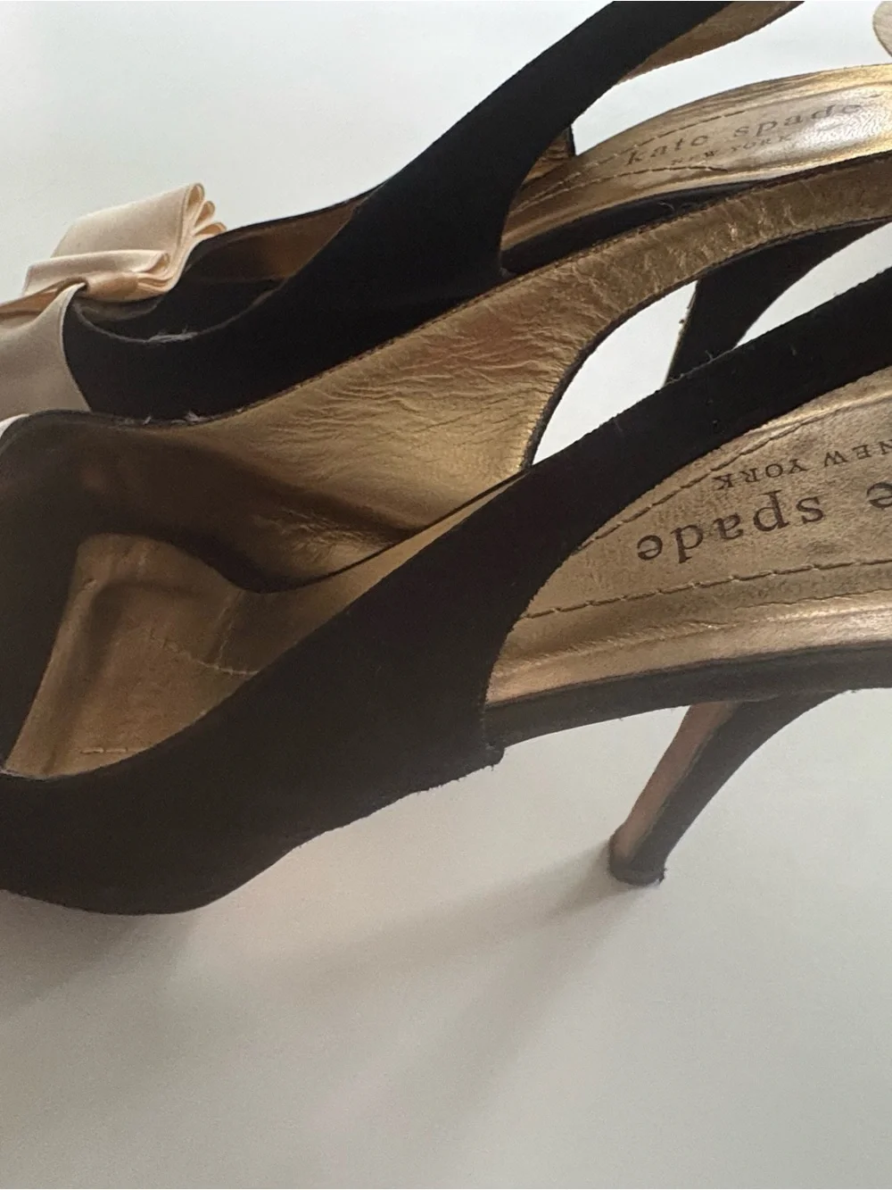 kate spade Black Slingback Heels with Cream Bow Accent